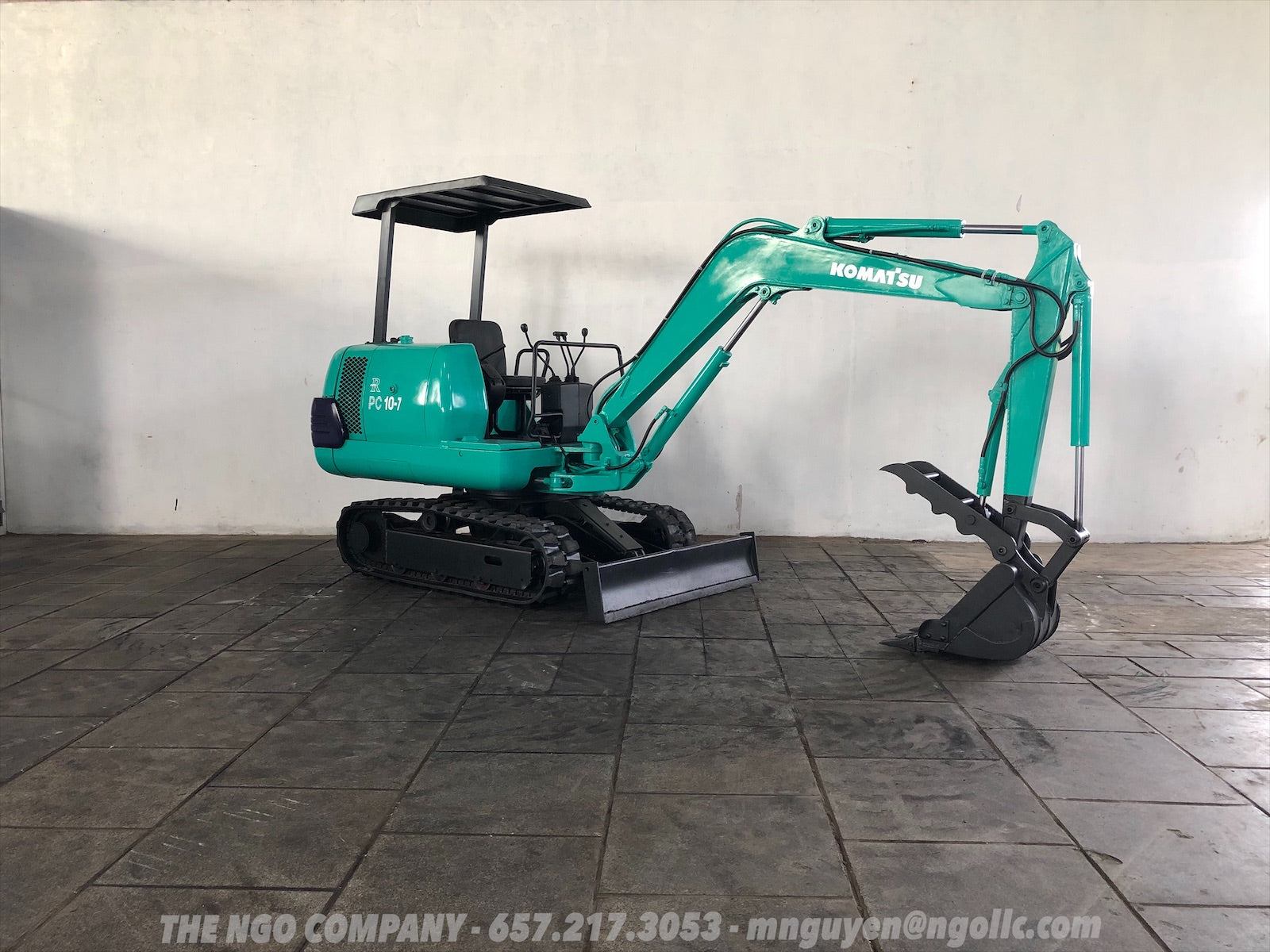 013.02 Komatsu PC10-7 Mini Excavator S/N 25017 – The NGO Company