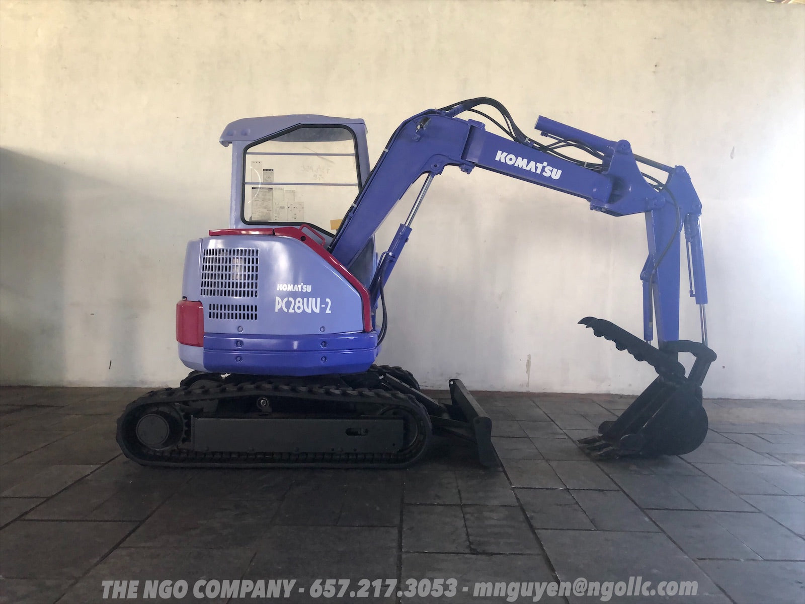 014.07 Komatsu PC28UU-2E Mini Excavator S/N 11412 – The NGO Company