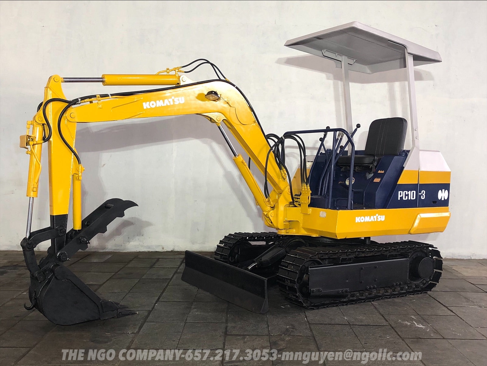 015.01 Komatsu PC10-3 Mini Excavator S/N 5701 – The NGO Company